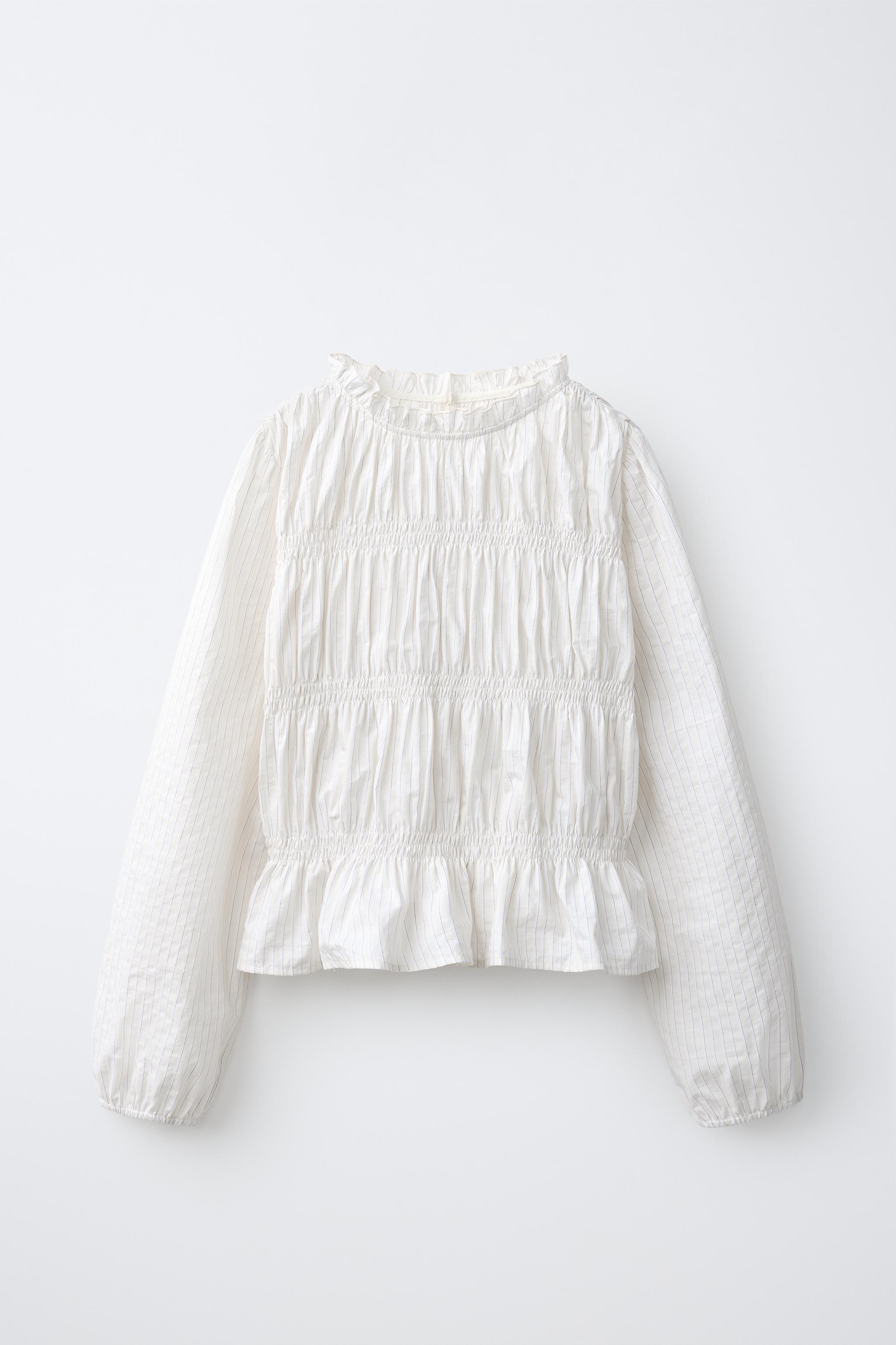 BLOUSE À RAYURES ET ÉLASTIQUES